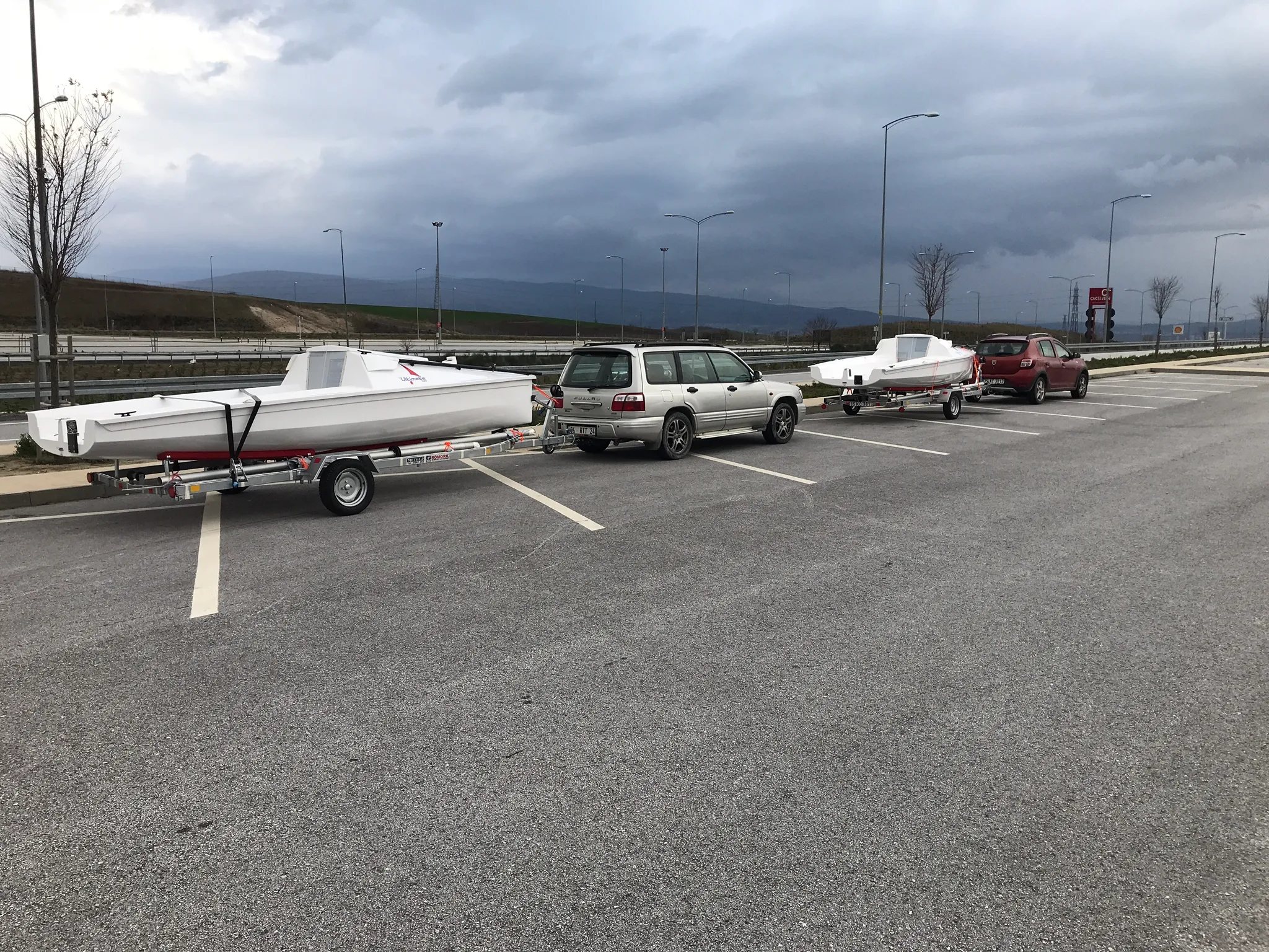 The U530 convoy on the road to the Aegean. The boat lives at home, not in a marina.